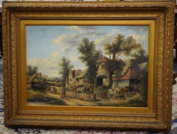 C. Morris, oil on canvas, Village scene with figures and horses, signed, 49 x 75cm, ornately gilt framed. Condition - some losses to the paint